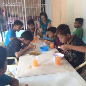 feeding street kids in the Philippines